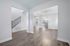 unfurnished foyer area with stairs and room in home
