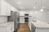 Chef inspired kitchen with white cabinets
