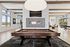 Elegant game room featuring a pool table, large windows, modern lighting, and a decorative fireplace.