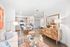 Open-concept living and dining area at The Grant with modern finishes and natural light.