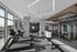 Modern fitness center featuring state-of-the-art equipment, large windows with city views, and sleek lighting.