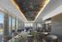 Elegant urban living area with panoramic city views and chic modern decor.