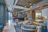 Sophisticated communal lounge featuring modern seating, ambient lighting, and stylish decor for an inviting atmosphere.