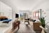 Modern apartment interior with a cozy living area, stylish furniture, and a bright bedroom leading to a sunny balcony with city views.