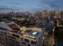 Luxurious rooftop oasis with a sparkling pool and breathtaking city skyline views, perfect for urban living enthusiasts.