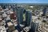 Vibrant urban cityscape with modern high-rise buildings, showcasing a bustling downtown atmosphere and panoramic skyline views.