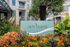 Charming urban residence at Left Bank with vibrant garden and modern architecture.