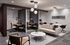 Modern co-working space with stylish seating, elegant workstations, and chic lighting in a serene setting.
