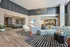 Elegant lobby with modern furnishings, stylish lighting, and cozy seating areas, perfect for relaxation and socializing.