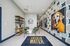 Chic apartment lobby with modern art of dogs, stylish seating, and inviting decor at 333 Water.