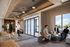 Elegant lobby space featuring modern design, comfortable seating, and stylish lighting fixtures, ideal for socializing or business discussions.