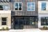 Contemporary apartment building entrance with stylish facade and modern design elements at The Atwood.