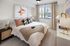 Large bedrooms with hardwood flooring