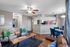 Inviting living space featuring a modern open-concept layout with stylish seating, a chic dining area, and a cozy kitchen, perfect for contemporary living.