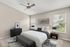 Elegant bedroom with a cozy bed, modern ceiling fan, and stylish decor, creating a serene retreat filled with natural light.