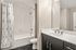 Bathroom with tub and sink