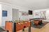 Indoor community area with pool and foosball
