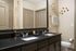 bathroom with double vanity