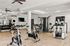 furnished fitness center with equipment
