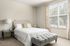 furnished bedroom in apartment home