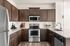 furnished kitchen area of apartment home