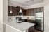furnished kitchen area of apartment home