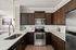 furnished kitchen area of apartment home