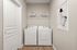 furnished laundry area of apartment home