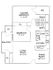 Elegant floor plan showcasing a master bedroom with en-suite, second bedroom, spacious living room with balcony, and modern kitchen with adjacent dining area.