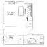 Modern floor plan featuring a spacious living area, cozy sleeping area, efficient kitchen, and a well-equipped bath with laundry facilities.