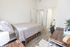 University Pointe, interior, bedroom, large bed, desk, chair, bathroom,