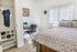 University Pointe, interior, bedroom, large bed, window, desk, chair, closet, wood floor
