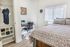 University Pointe, interior, bedroom, large bed, window, desk, chair, closet, wood floor