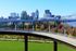 Elevated walkway over a park near our apartments in Louisville, featuring a view of the Louisville skyline.