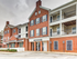 East Edge building exterior featuring the outside of the leasing office.