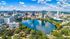 View of the city of Orlando near our student living apartments, featuring a sign pointing towards Downtown.