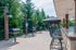 Outdoor lounge at our student apartments near Penn State, featuring grill stations and counter seating.