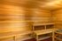 The sauna at our student apartments near Penn State, featuring wood grain interiors and a control button on the outside.