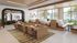 Chic communal space with modern seating, natural lighting, and stylish decor, perfect for coworking or casual gatherings.