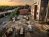 Inviting rooftop terrace with comfortable seating, modern grills, and scenic views, perfect for relaxation and gatherings.