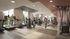 Bright, modern fitness center with state-of-the-art equipment, large windows, and engaging workout spaces.