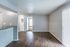 Living and dining area with wood-style floors at Deerfield Apartments in Memphis, TN