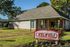 Leasing office with Deerfield sign at Deerfield Apartments in Memphis, TN