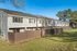 Townhomes with fenced patios at Collier Village Apartments in Collierville, TN