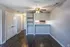 Dining area with ceiling fan and built-in shelves at Collier Village Apartments in Collierville, TN
