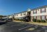 Apartment buildings along resident parking at Countryside Village in Memphis, TN
