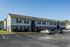 Wide view of buildings and parking lot at Countryside Village in Memphis, TN