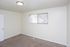 Second bedroom with carpet and a window at Fairbrook in Salt Lake City, UT