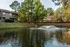 Wide view of the pond and fountain at Hickory Forest in Memphis, TN