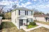 Two-story home with white siding at Jackson Heights Residential in West Memphis, AR